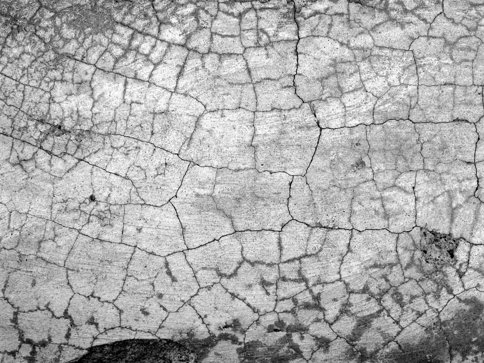 Aerial view of dried, cracked clay ground